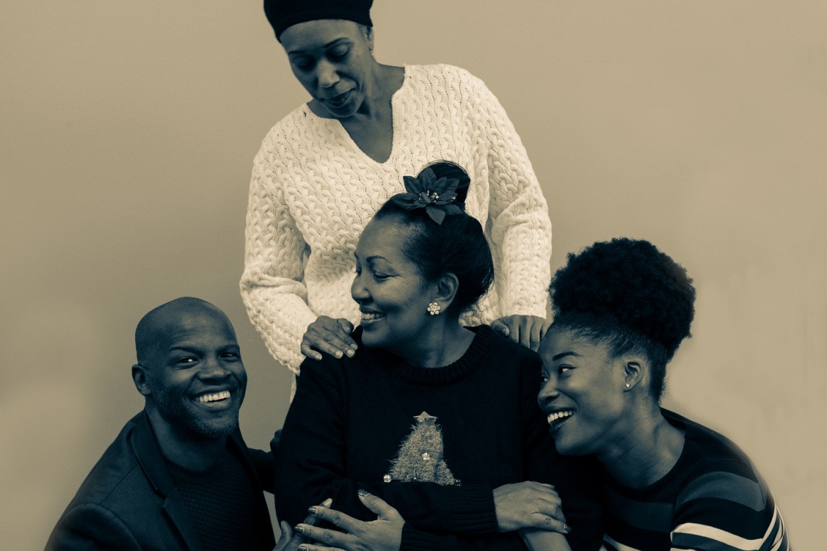 (Clockwise from top) Renee Miche'al as "Shelly", Jaquai Wade as "Averie", Catherine Whiteman as "Dotty", and Yusef Miller as "Donnie" in Soul Rep's regional premiere of Colman Domingo's DOT. Photo by