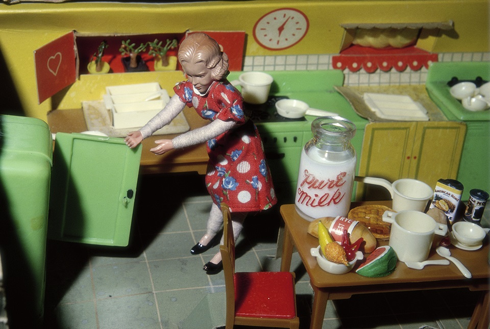Laurie Simmons, Woman Opening Refrigerator/Milk to the Right,1979