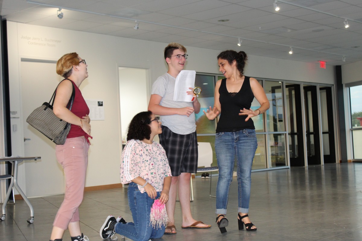 Artistic Director, Noelle, Carmen (right) training youth actors