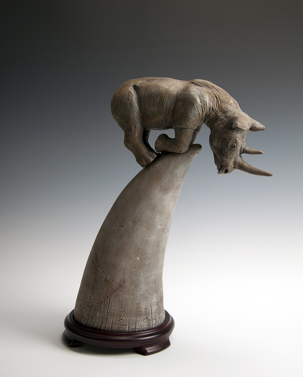 On the Brink Ceramic sculpture of rhino
