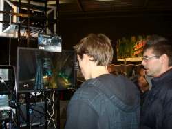 Alexander Ringe of COmplexity Games in New York plays Bionic Commando for the first time as friends watch on.