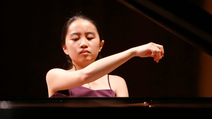 Evelyn Mo, 16, of the United States, performs in the quarterfinal round of the Cliburn International Junior Piano Competition and Festival, in Fort Worth, Texas, Wednesday, June 24, 2015. (Cliburn/Rodger Mallison)