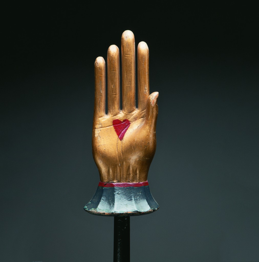 Odd Fellows heart-in-hand staff, ca. 1890s Polychrome wood, 10 × 4 × 2 in. on 52 in. rod Webb Collection