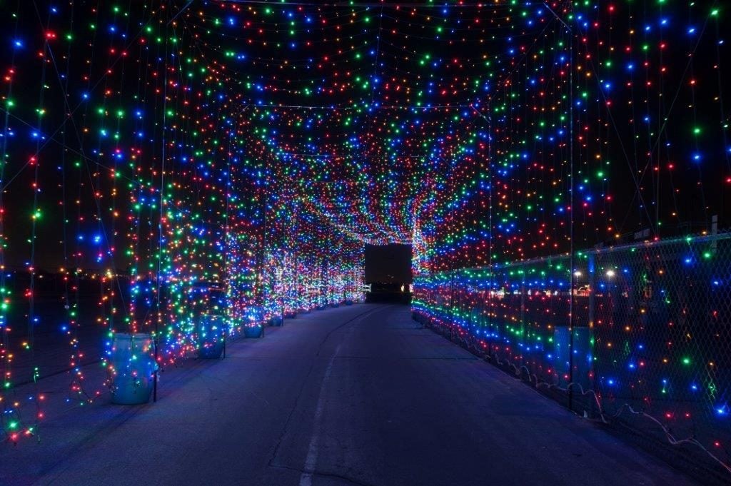 A tunnel of colored lights is just one of the many displays at Gift of Lights. Photo: Gift of Lights at Texas Motor Speedway