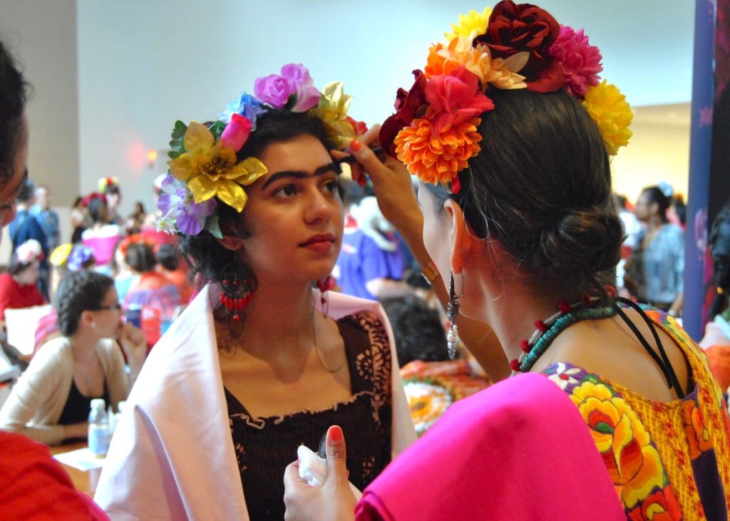 Elisa Saldivar gets a Frida Kahlo-inspired look, courtesy of Reina Rebelde. The makeup line was helping participants in the record attempt get ready before the final tally. 