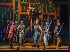 Robin Hood (Nick Bailey, far right), and his Merry Men, in ‘Hood,’ at Dallas Theatre Center. Robin Hood (Nick Bailey, far right), and his Merry Men, in ‘Hood,’ at Dallas Theatre Center. Karen Almond