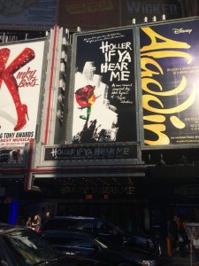Signs for "Holler If You Hear Me" in New York City. Photo: Jackson and cast in "The Lion King." Photo: twitter.com/ChrisisSingin