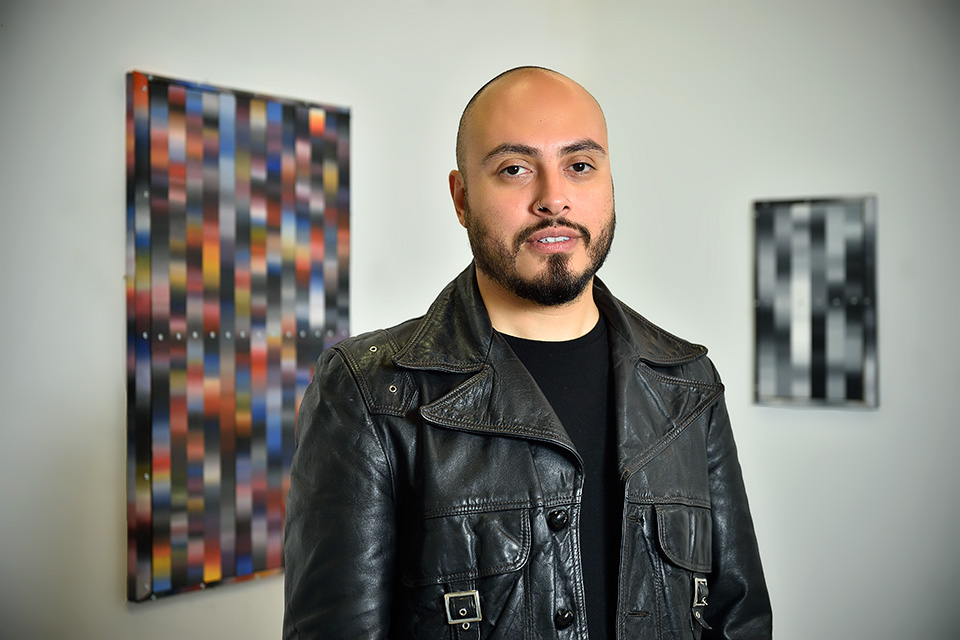 Artist Arthur Pena photographed in his west Dallas studio for North Texan in Dallas, Texas on May 14, 2015. Photos by Michael Clements.