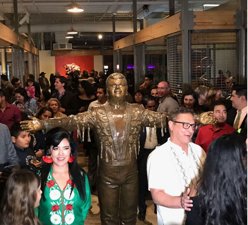 Mercado Artesanal opened in Oak Cliff over the weekend. Visitors are greeted at the entrance with a statue of the late Mexican singer Juan Gabriel. The sculpture is the work of artist Edysa Ponzanelly (left). Photos: STELLA M CHÁVEZ
