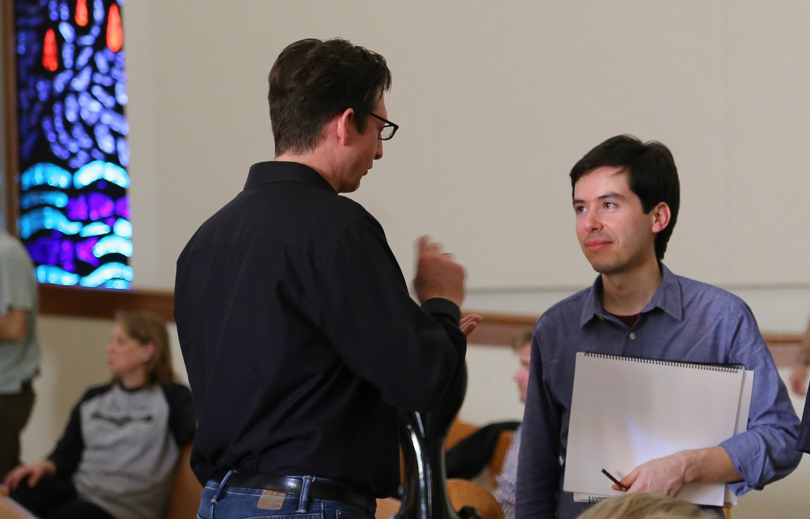 Consulting with TCU professor and composer Till McIvor Meyn (left). Photo: Jerome Weeks