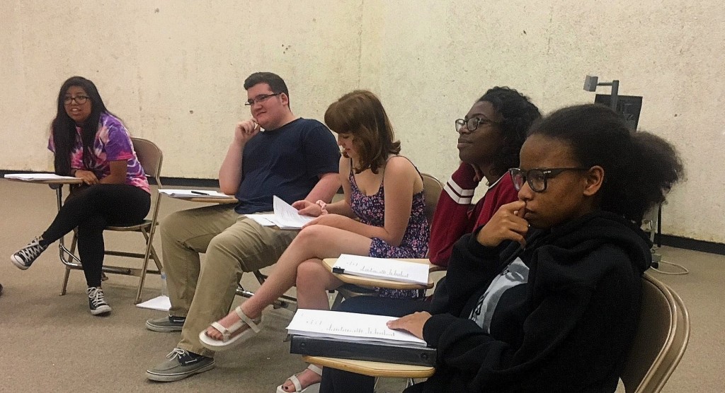 Cry Havoc actors concentrating at table read (l to r): Regina Juarez, Andrew Beeson, Angie Hogue, Trinity Gordon and Jamayah Parker. Photo: Jerome Weeks