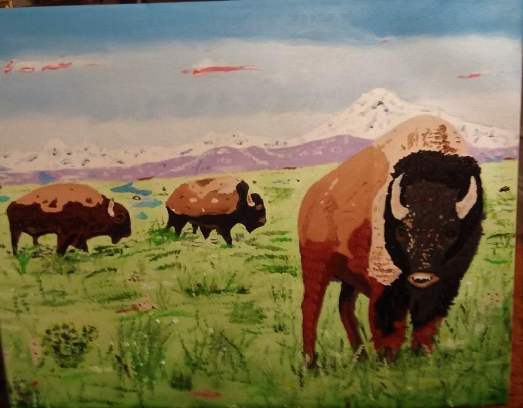 Paintinf of three buffalo grazing on grass.