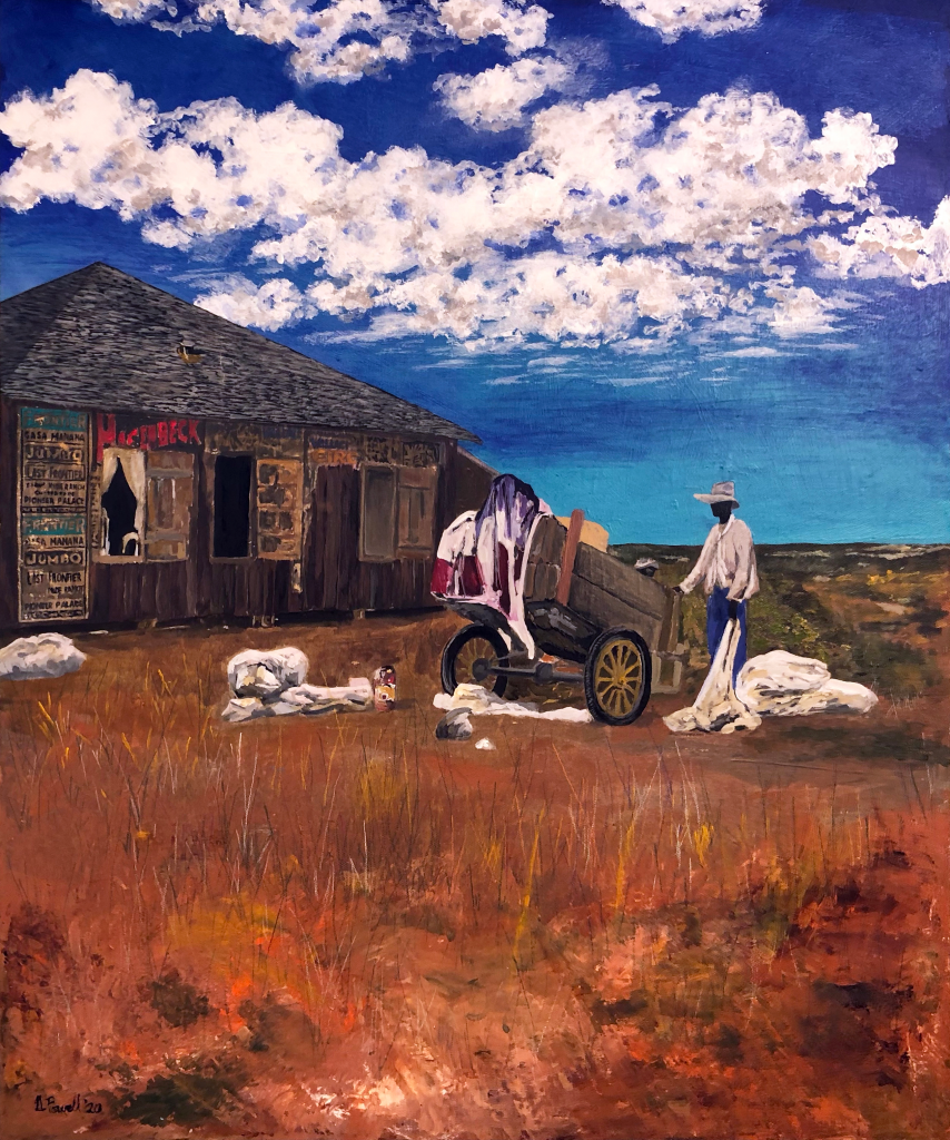 A man stands near a wagon in rural East Texas. 